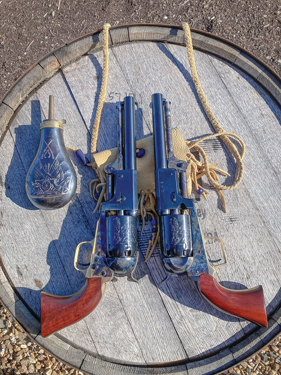 That’s a Whitneyville transitional on the right as evidenced by the grip frame, trigger guard and the cylinder stops. The Whitneyville was the first revolver built on the cutdown pattern of the Walker revolver.